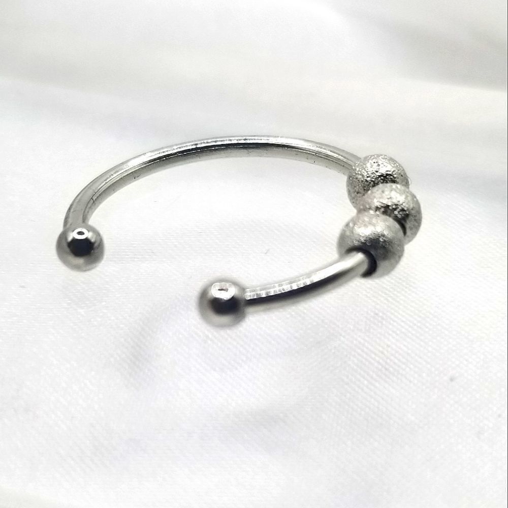 Women's silver toned ball ring band size 6.